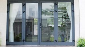 Mẫu cửa sắt 4 cánh kính cường lực